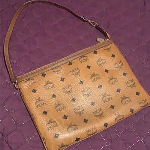 Authentic MCM but very worn.
